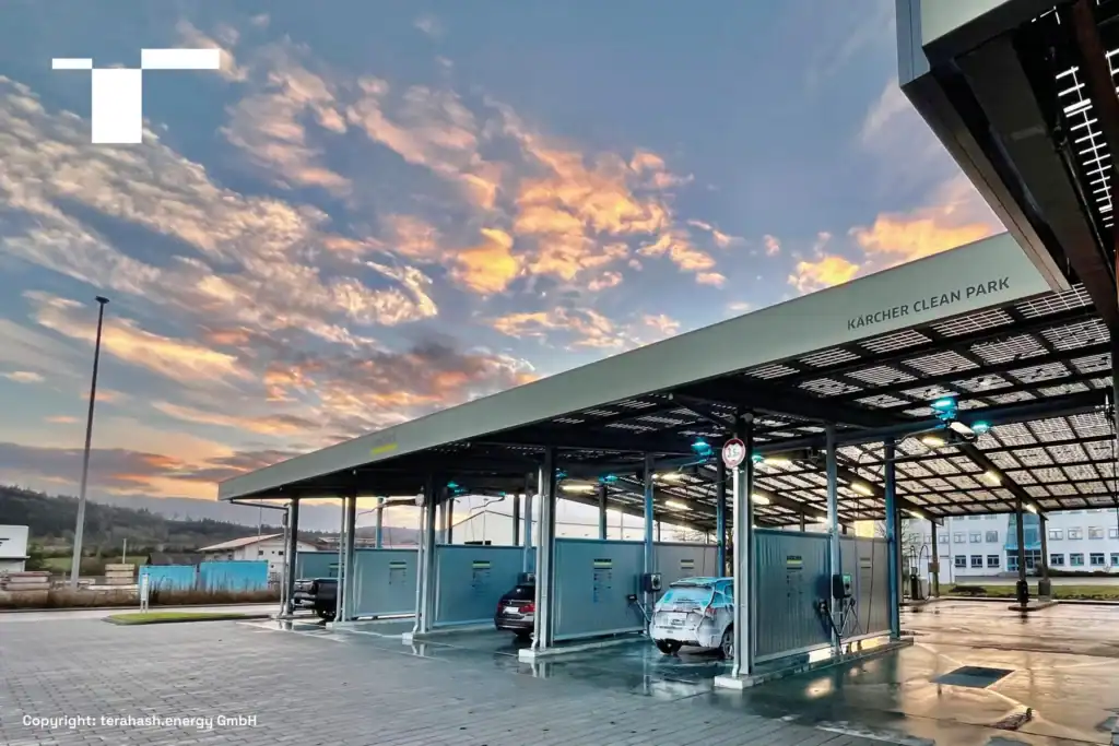 Münsingen car wash with a solar canopy at dusk